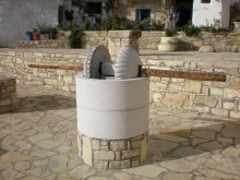 Grey marble Gortynis bush-hammered excact copy of ancient roman olive oil mill.